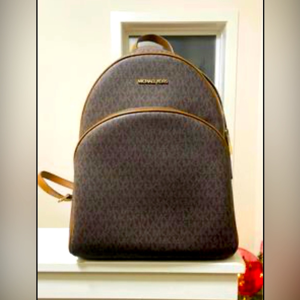 Michael Kors backpack and long wallet
